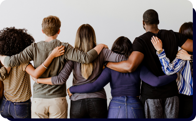 Group of people locking shoulders